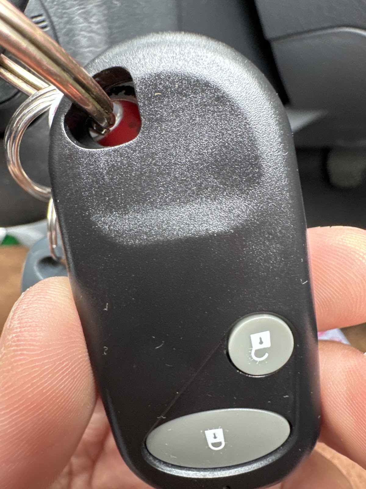 A car key remote brought in for repair at Key-Wee Lock and Repair